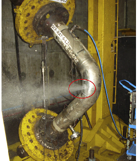 Occurrence of through-wall crack indicated by a sharp water jet