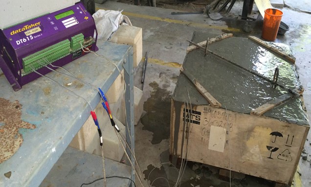 Photographic view of concrete block with data acquisition system