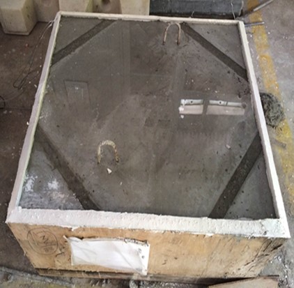 Photograph of hardened mock concrete block under chilled water curing
