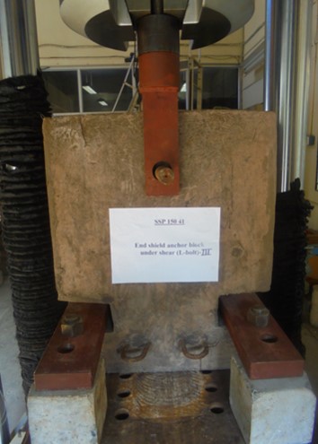 Testing of shear capacity of end shield anchor bolts
